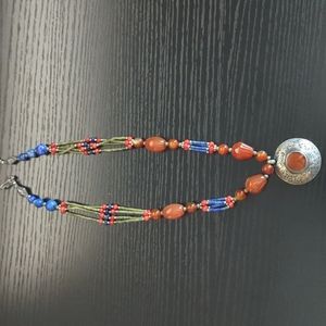 Amber like beaded necklace with pendant